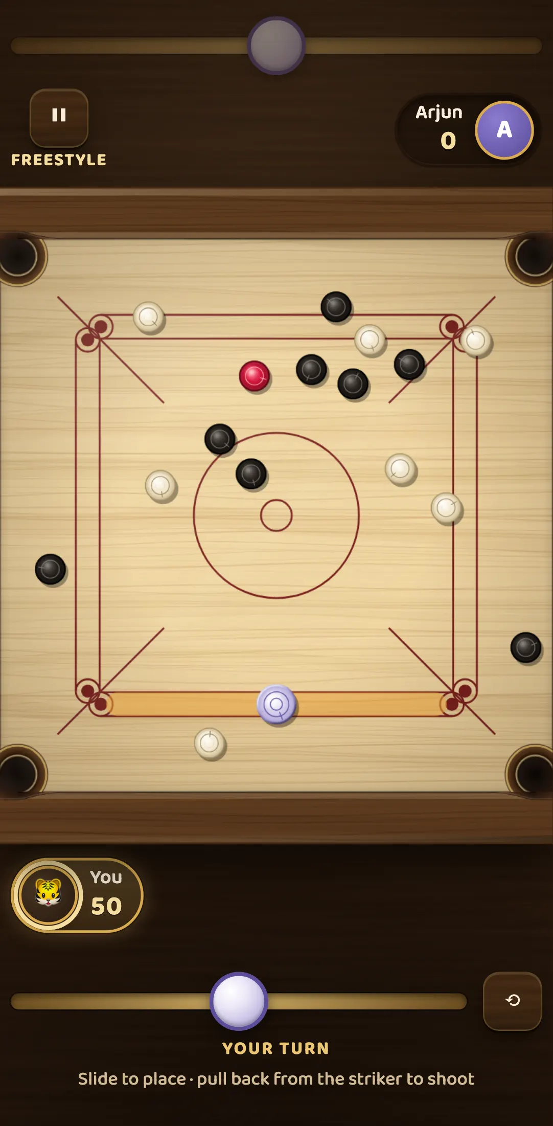 A Freestyle match on a phone. You have 50 points after pocketing two whites and one black, Arjun has 0, and the red queen is still on the board with both colours spread around it.